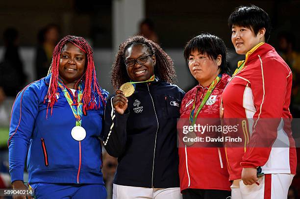 Over 78kg medallists L-R: Silver; Idalys Ortiz of Cuba, Gold; Emilie Andeol of France, Bronzes; Kanae Yamabe of Japan and Song Yu of China during the...