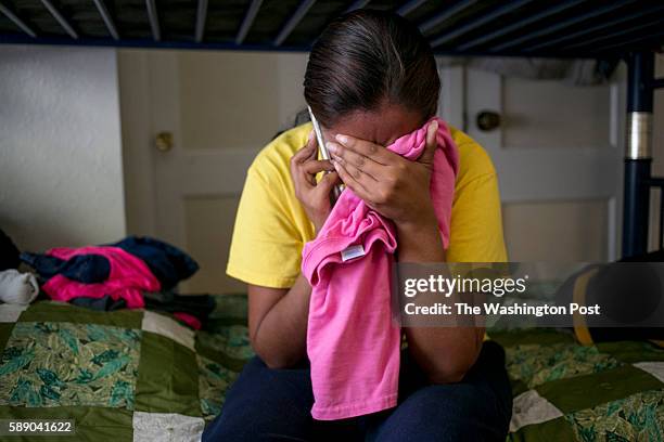 July 13, 2016: Karla speaks on the phone with her mother in El Salvador, who she had not spoke with since leaving the country. Karla and her daughter...