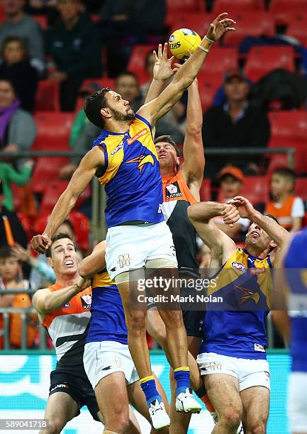 Josh Hill of the Eagles and Jonathan Patton of the Giants contest a mark during the round 21 AFL match between the Greater Western Sydney Giants and...