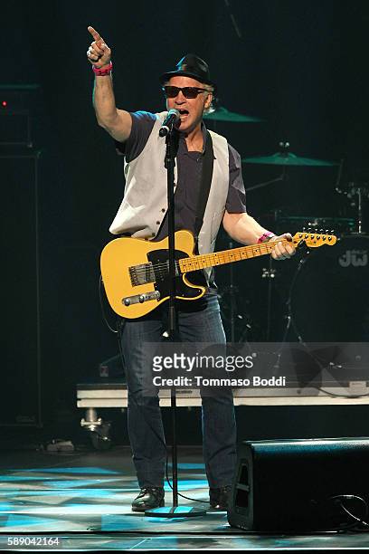 Musician Tommy Heath of Tommy Tutone performs on stage at the 80's Weekend held at Microsoft Theater on August 12, 2016 in Los Angeles, California.