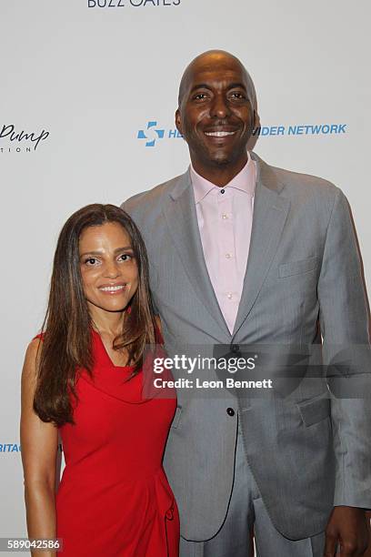 Natasha Duffy and Retired NBA players John Salley attends 16th Annual Harold And Carole Pump Foundation Gala - Arrivals at The Beverly Hilton Hotel...