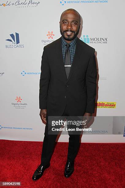 Retired NFL player Marshall Faulk attends 16th Annual Harold And Carole Pump Foundation Gala - Arrivals at The Beverly Hilton Hotel on August 12,...