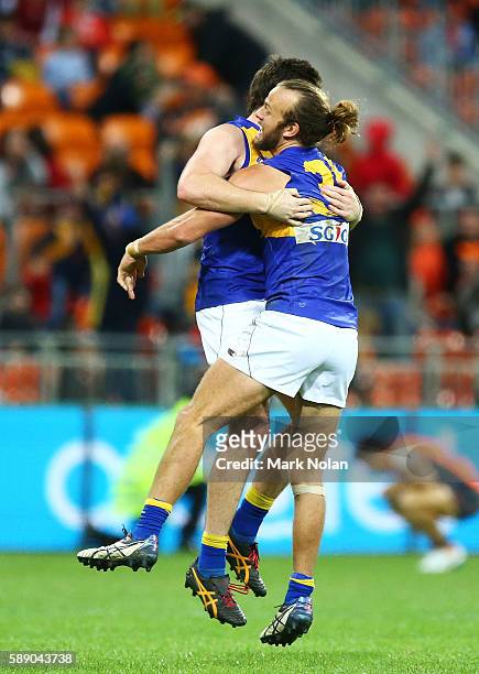 Jeremy McGovern and Will Schofield of the Eagles during the round 21 AFL match between the Greater Western Sydney Giants and the West Coast Eagles at...