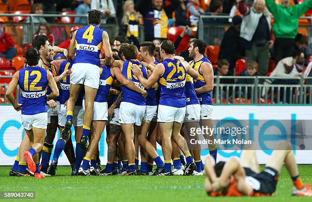 The West Coast Eagles celebrate winning the round 21 AFL match between the Greater Western Sydney Giants and the West Coast Eagles at Spotless...