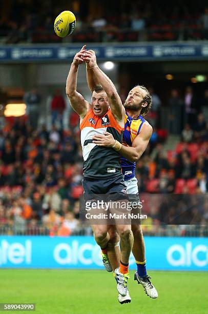 Jack Steele of the Giants and Will Schofield of the Eagles contest a mark during the round 21 AFL match between the Greater Western Sydney Giants and...