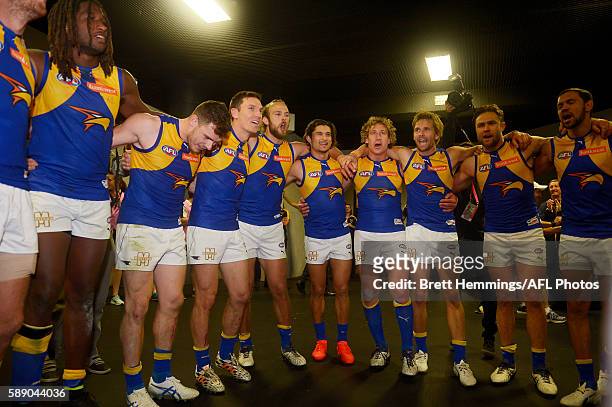 West Coast players sing their team song after victory during the round 21 AFL match between the Greater Western Sydney Giants and the West Coast...