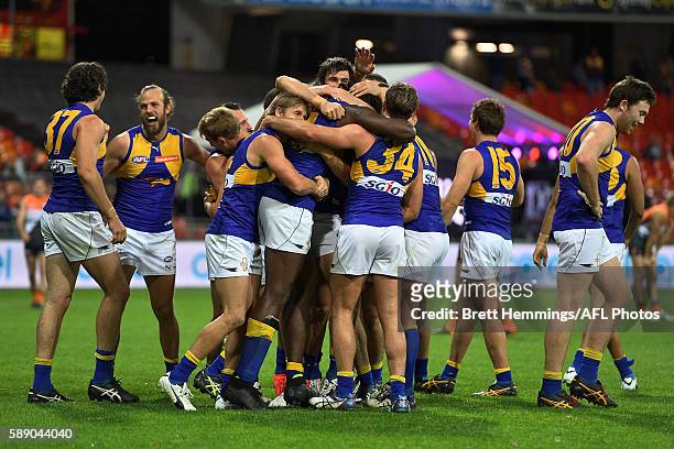 West Coast players celebrate victory during the round 21 AFL match between the Greater Western Sydney Giants and the West Coast Eagles at Spotless...