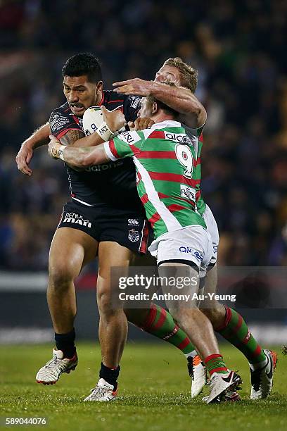 Albert Vete of the Warriors on the charge against Damien Cook of the Rabbitohs during the round 23 NRL match between the New Zealand Warriors and the...