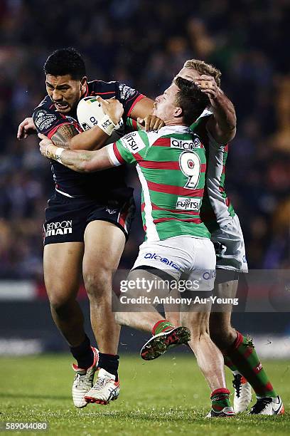 Albert Vete of the Warriors on the charge against Damien Cook of the Rabbitohs during the round 23 NRL match between the New Zealand Warriors and the...