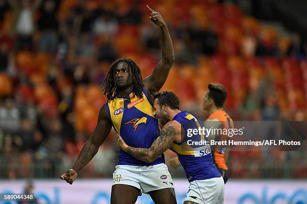 Nic Naitanui of the Eagles celebrates kicking the winning goal during the round 21 AFL match between the Greater Western Sydney Giants and the West...