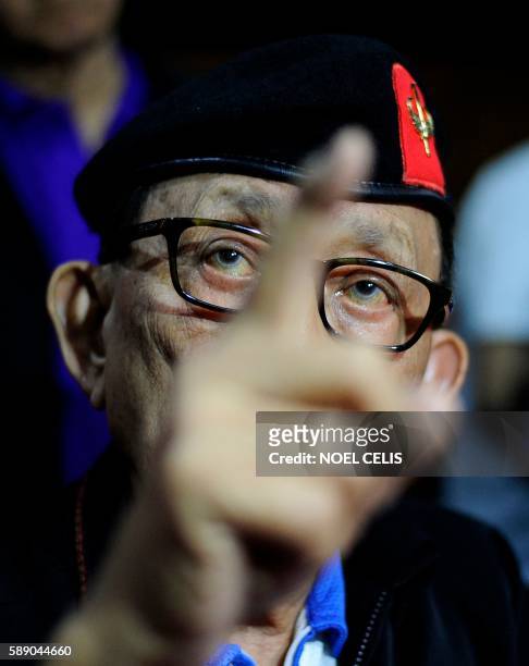 Former Philippine president Fidel Ramos gestures during a press conference at Camp Aguinaldo in Manila on August 13, 2016. - The 88-year-old former...