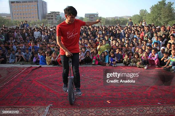 Internally displaced Afghan children perform during the 11th Afghanistan National Juggling Championship organized by the Mobile Mini Circus for...