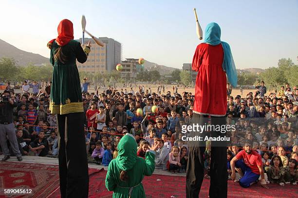 Internally displaced Afghan children perform during the 11th Afghanistan National Juggling Championship organized by the Mobile Mini Circus for...