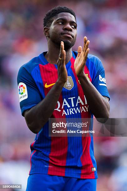 Samuel Umtiti of FC Barcelona applauds during the team official presentation ahead of the Joan Gamper trophy match between FC Barcelona and UC...