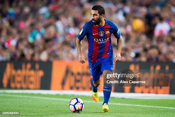 Arda Turan of FC Barcelona conducts the ball during the Joan Gamper trophy match between FC Barcelona and UC Sampdoria at Camp Nou on August 10, 2016...