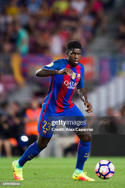 Samuel Umtiti of FC Barcelona conducts the ball during the Joan Gamper trophy match between FC Barcelona and UC Sampdoria at Camp Nou on August 10,...