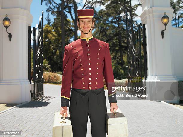 bellhop - bell boy stock pictures, royalty-free photos & images