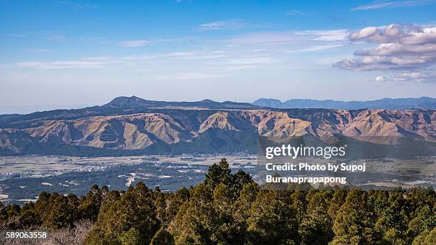 aso village from viewpoint on the mountain , kyushu , japan - 阿蘇山 ストックフォトと画像