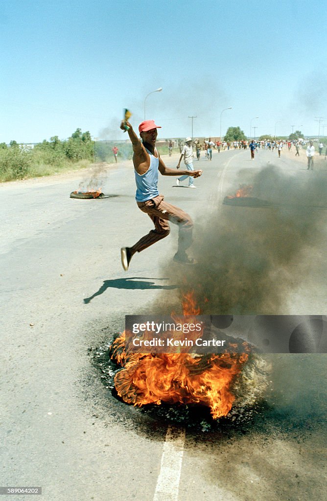 People celebrate victory in Mmabatho streets after the white
