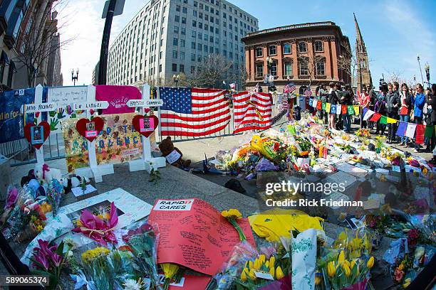 Crosses memorializing Boston Marathon bombing victims Martin Richard, Lu Lingzi and Krystie Cambell at a memorial to all victims of the Boston...