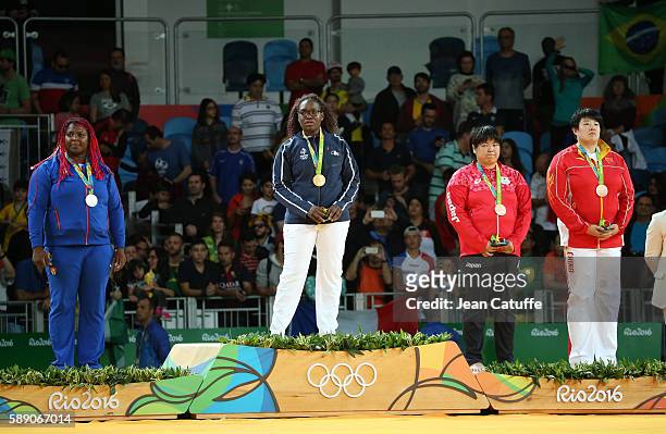 Silver medalist Idalys Ortiz of Cuba, gold medalist Emilie Andeol of France, bronze medalists Kanae Yamabe of Japan and Song Yu of China pose during...