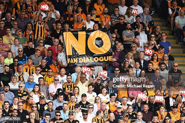 Hull City fans hold up NO signs and banners in protest during the Premier League match between Hull City and Leicester City at KCOM Stadium on August...