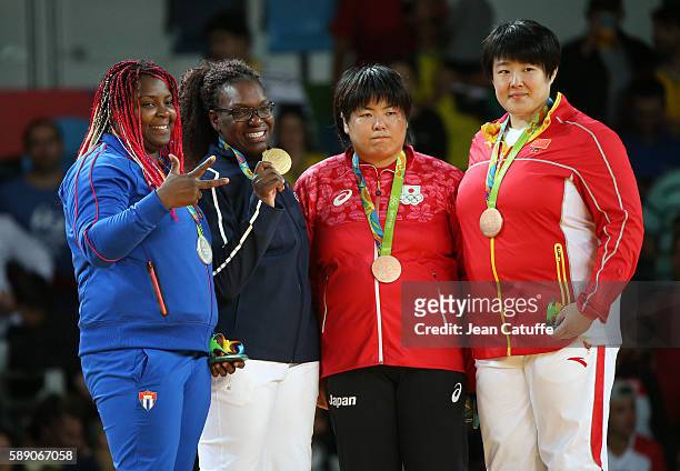 Silver medalist Idalys Ortiz of Cuba, gold medalist Emilie Andeol of France, bronze medalists Kanae Yamabe of Japan and Song Yu of China pose during...