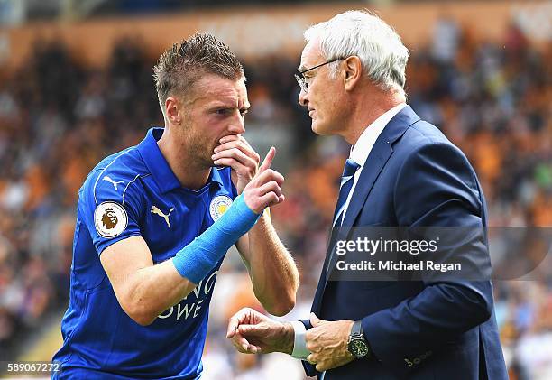 Claudio Ranieri, Manager of Leicester City and Jamie Vardy of Leicester City talk tatics on the sideline during the Premier League match between Hull...