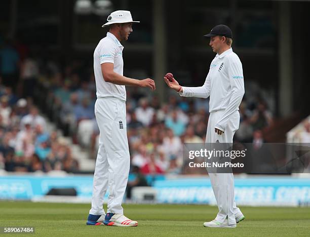 England's Stuart Broad and England's Joe Root during Day Three of the Fourth Investec Test Match between England and Pakistan played at The Kia Oval...