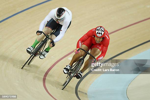 Chao Xu of China and Joachim Eilers of Germany compete during the Men's Sprint 1/8 Finals on Day 8 of the Rio 2016 Olympic Games at the Rio Olympic...