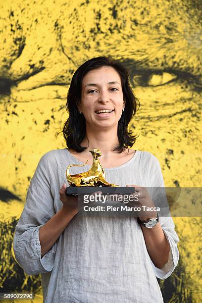 Ralitza Petrova poses with the Pardo d'oro during the 69th Locarno Film Festival on August 13, 2016 in Locarno, Switzerland.