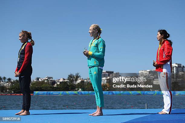 Silver medalist Genevra Stone of the United States, gold medalist Kimberley Brennan of Australia and bronze medalist Jingli Duan of China stand on...