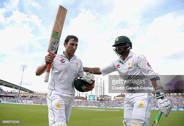Younis Khan of Pakistan is congratuted by Sohail Khan as he leaves the field after making 218 during day three of the 4th Investec Test between...