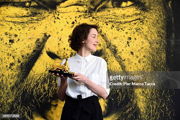 Nele Wohlatz poses with the Pardo for Best First Feature during the 69th Locarno Film Festival on August 13, 2016 in Locarno, Switzerland.
