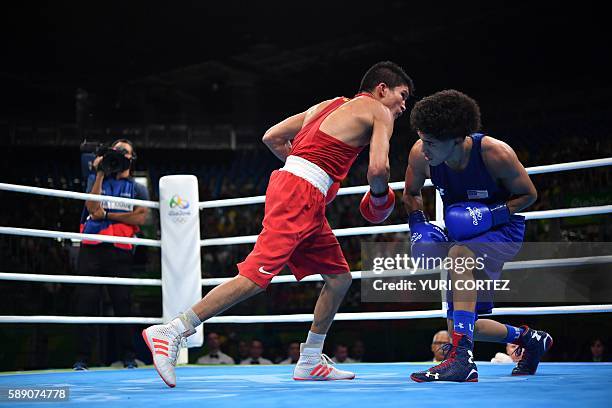 Brazil's Juliao Neto fights USA's Antonio Vargas during the Men's Fly at the Rio 2016 Olympic Games at the Riocentro - Pavilion 6 in Rio de Janeiro...
