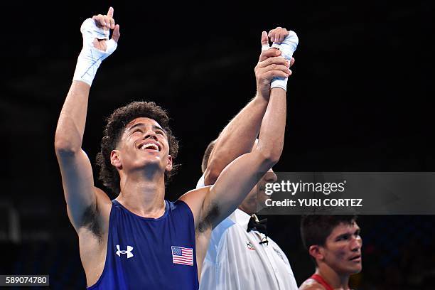 S Antonio Vargas reacts to winning against Brazil's Juliao Neto during the Men's Fly at the Rio 2016 Olympic Games at the Riocentro - Pavilion 6 in...