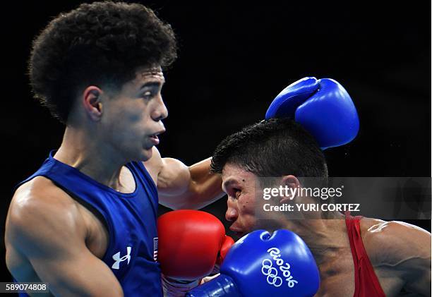 Brazil's Juliao Neto fights USA's Antonio Vargas during the Men's Fly at the Rio 2016 Olympic Games at the Riocentro - Pavilion 6 in Rio de Janeiro...