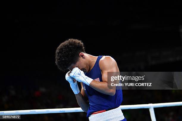 S Antonio Vargas reacts to winning against Brazil's Juliao Neto during the Men's Fly at the Rio 2016 Olympic Games at the Riocentro - Pavilion 6 in...