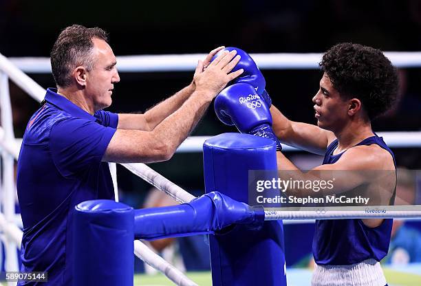 Rio , Brazil - 13 August 2016; Antonio Vargas of USA celebrates his victory over Juliao Neto of Brazil with Team USA boxing coach Billy Walsh during...
