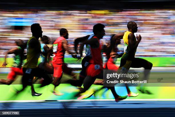 Usain Bolt of Jamaica competes in the Men's 100m Round 1 on Day 8 of the Rio 2016 Olympic Games at the Olympic Stadium on August 13, 2016 in Rio de...