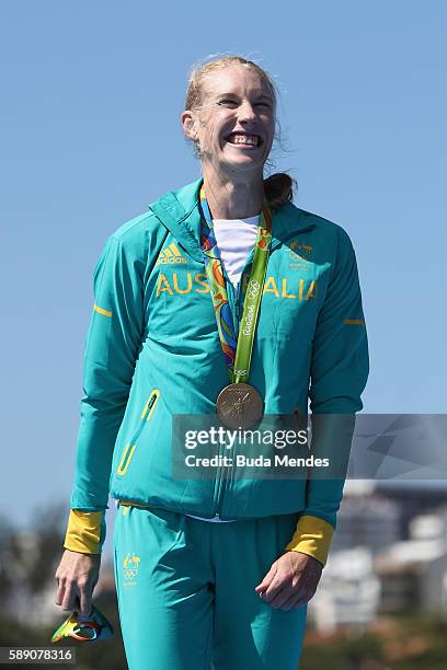 Gold medalist Kimberley Brennan of Australia celebrates on the podium at the medal ceremony for the Women's Single Sculls on Day 8 of the Rio 2016...