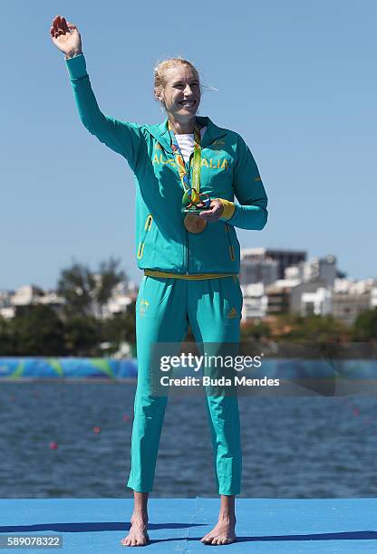 Gold medalist Kimberley Brennan of Australia celebrates on the podium at the medal ceremony for the Women's Single Sculls on Day 8 of the Rio 2016...