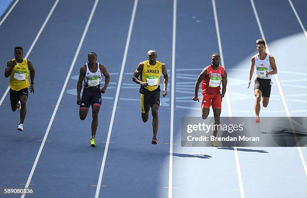 Rio , Brazil - 13 August 2016; Usain Bolt of Jamaica leads athletes, from left, Jahvid Best, of Saint Lucia, James Dasalou of Great Britain, Richard...