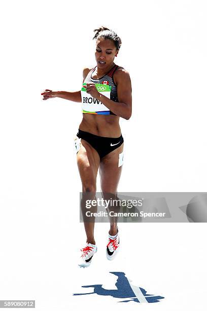 Alicia Brown of Canada competes in round one of the Women's 400m on Day 8 of the Rio 2016 Olympic Games at the Olympic Stadium on August 13, 2016 in...