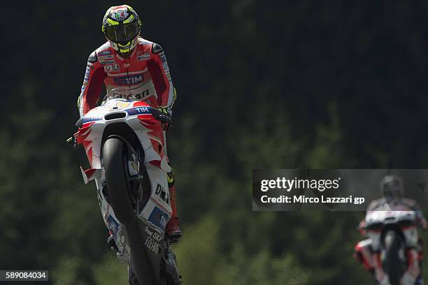 Andrea Iannone of Italy and Ducati Team lifts the front wheel during the MotoGp of Austria - Qualifying at Red Bull Ring on August 13, 2016 in...