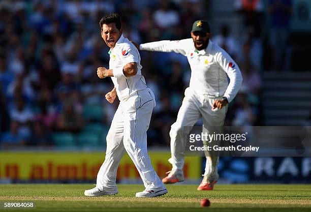 Yasir Shah of Pakistan celebrates with Pakistan captain Misbah-ul-Haq after dismissing Joe Root of England during day three of the 4th Investec Test...