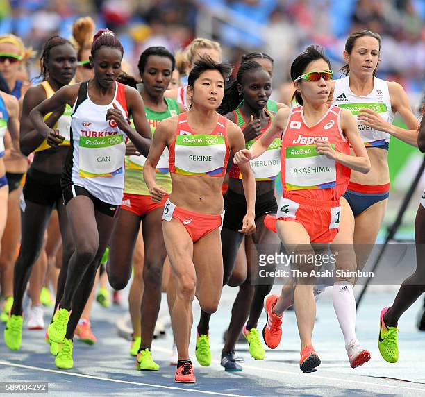 Hanami Sekine and Yuka Takashima of Japan compete in the Women's 10,000 metres final on Day 7 of the Rio 2016 Olympic Games at the Olympic Stadium on...