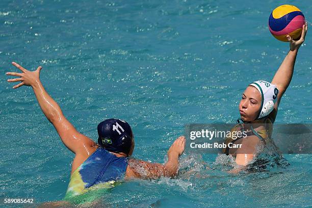 Zoe Arancini of Australia passes over Mariana Duarte of Brazil during the Womens Preliminaries on Day 8 of the Rio 2016 Olympic Games on August 13,...