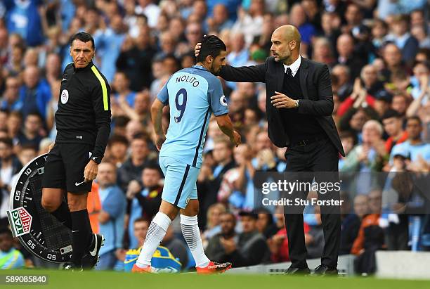 Josep Guardiola, Manager of Manchester City shows his appreication for Nolito of Manchester City efforts after being subbed during the Premier League...