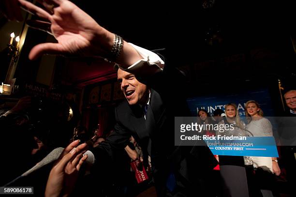 Republican presidential candidate Jon Huntsman celebrates his third place finish in the NH primary with his wife Mary Kaye Huntsman on NH Primary...